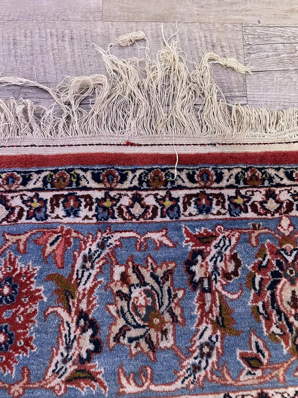 Antique wool Persian rug — traditional Kashan design

