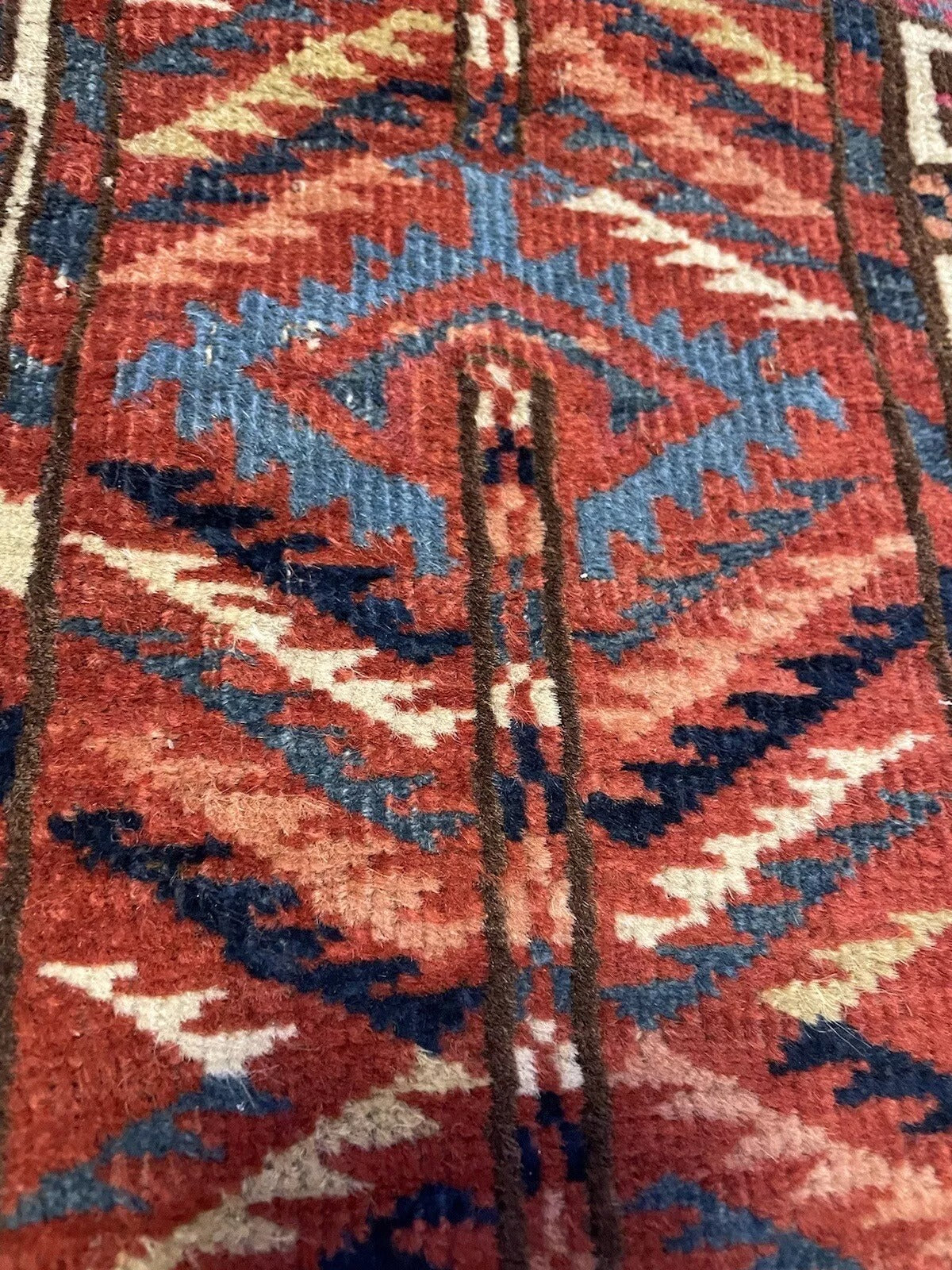 Handmade Turkmen Engsi wool rug for cultural interiors
