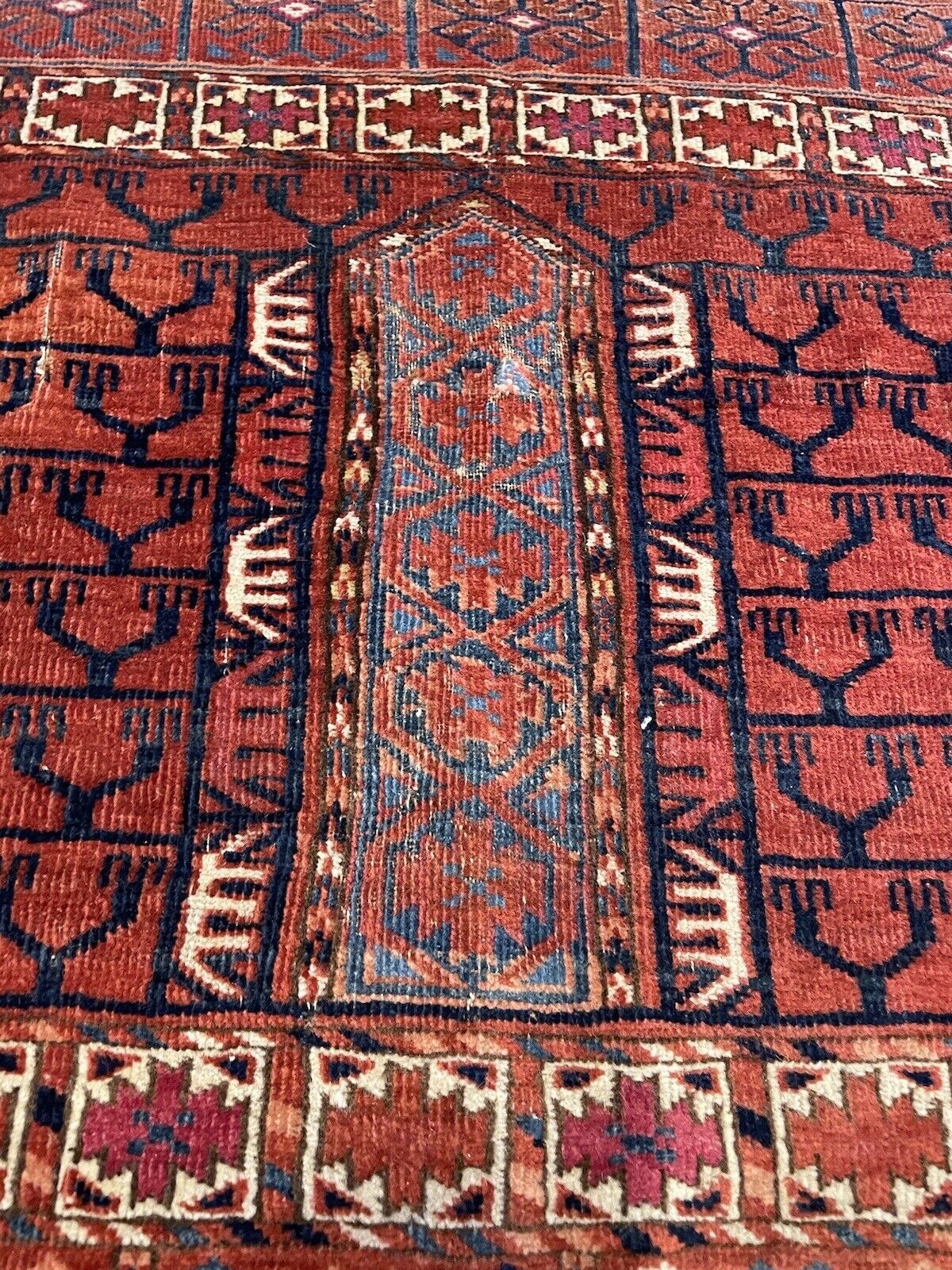 19th-century handmade Turkmen wool rug — collector's piece
