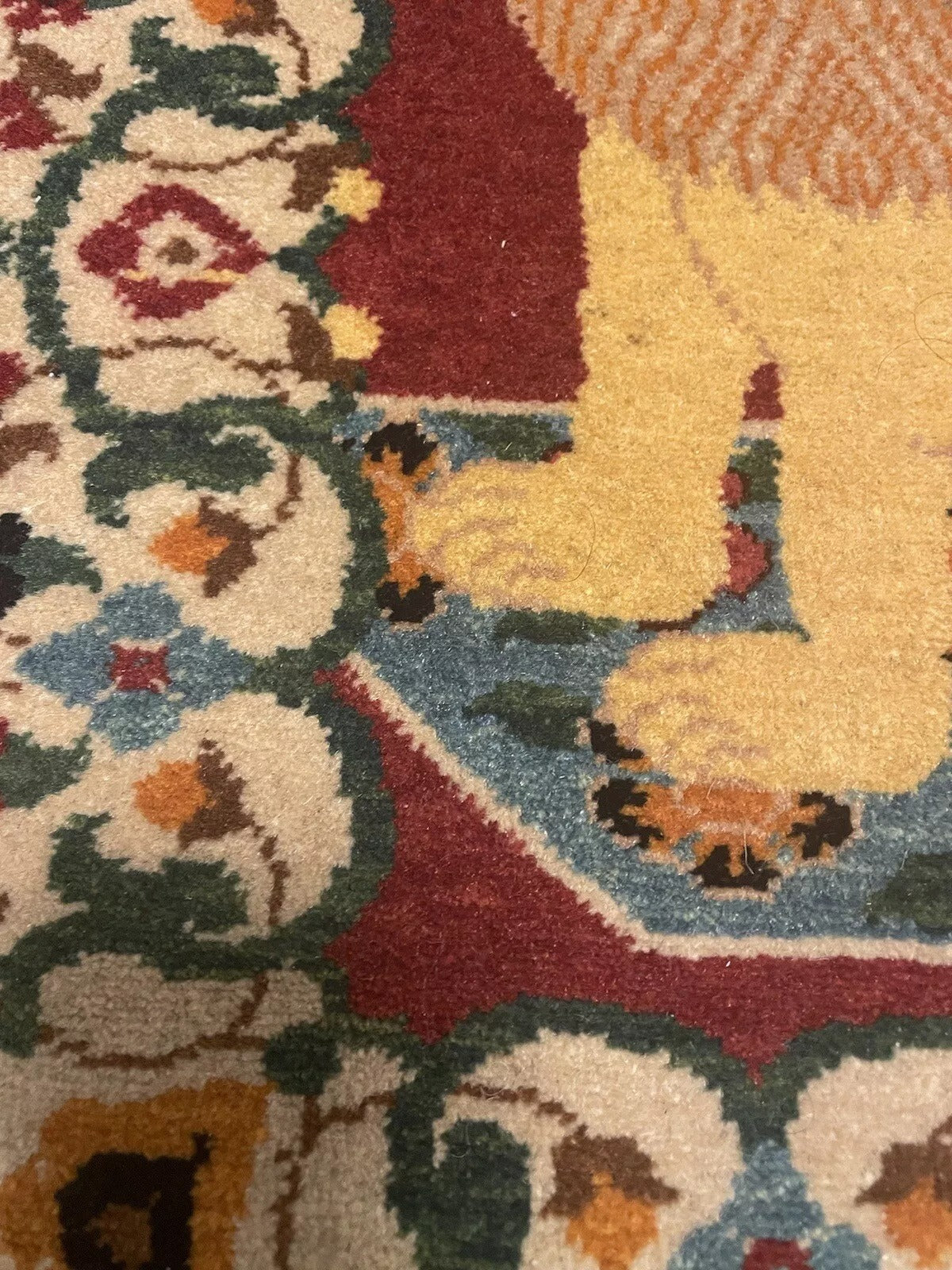 Small antique Persian Tabriz rug with detailed design
