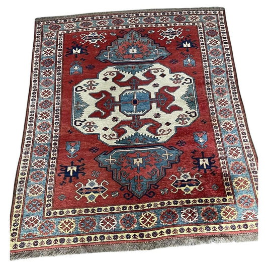 Handmade vintage Caucasian Kazak rug from the 1970s
