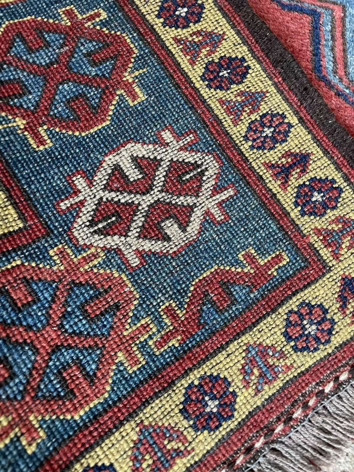 Boldly designed vintage Kazak wool rug from the Caucasus
