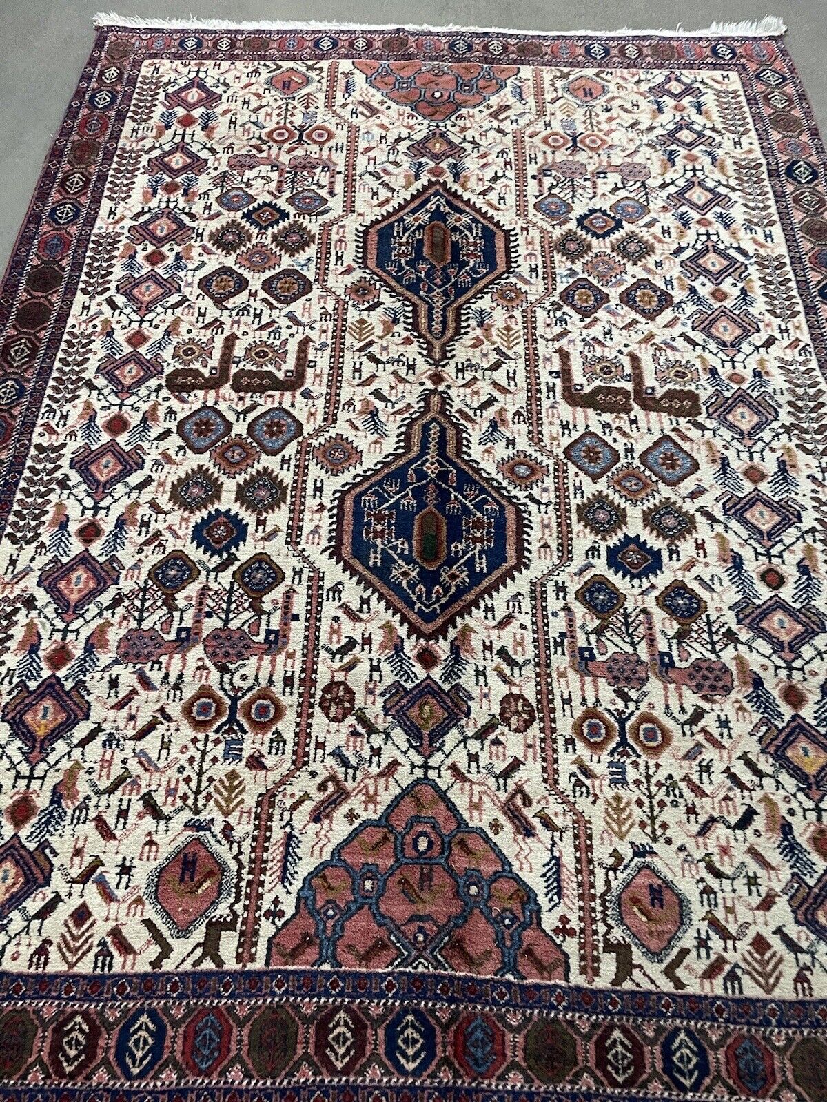 Detailed wool texture of a vintage Afshar rug
