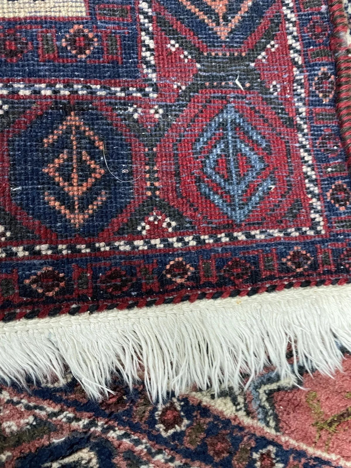Handwoven Persian Afshar rug showcasing intricate designs
