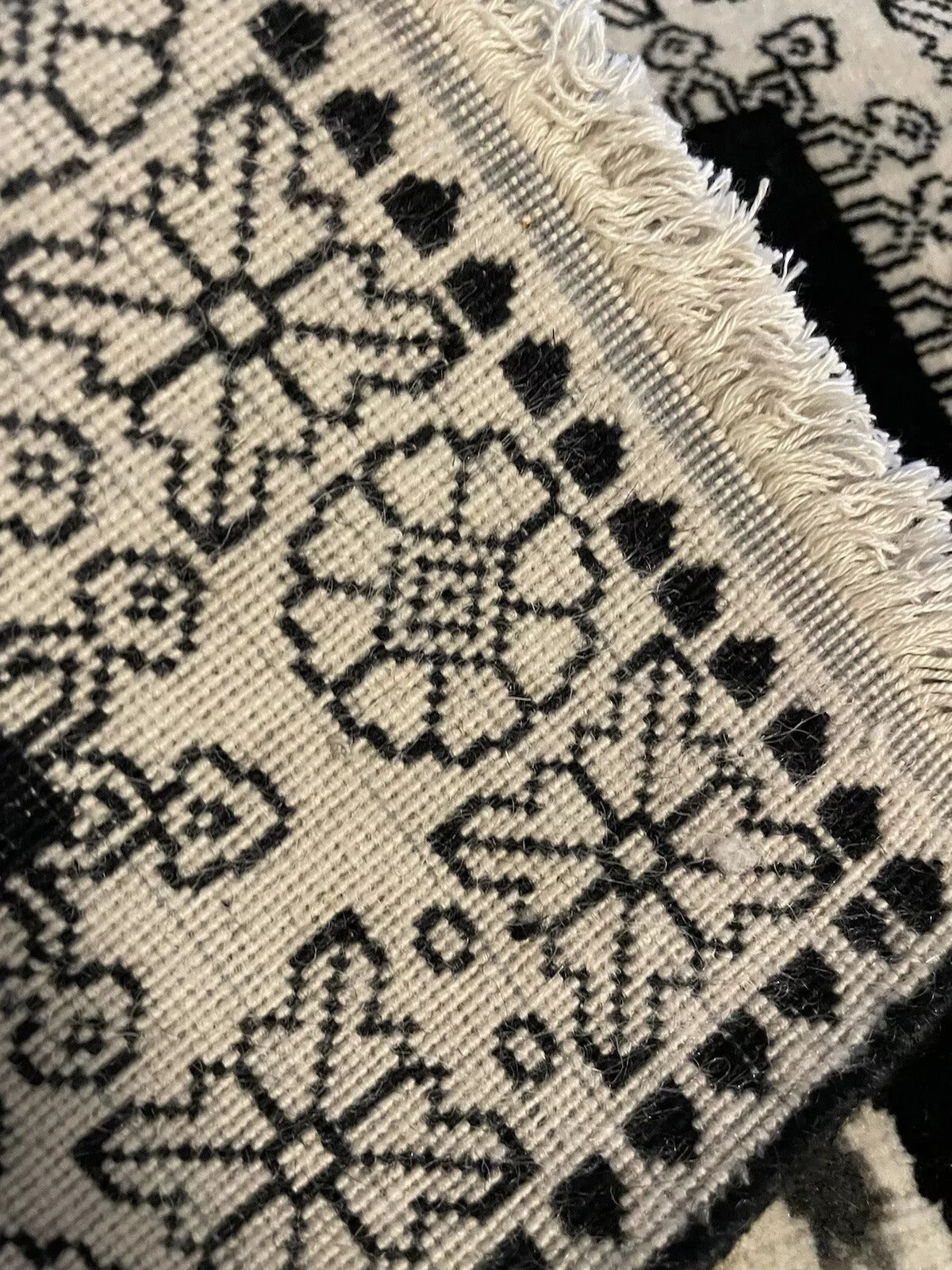 Vintage wool rug with black-and-white Kennedy portrait
