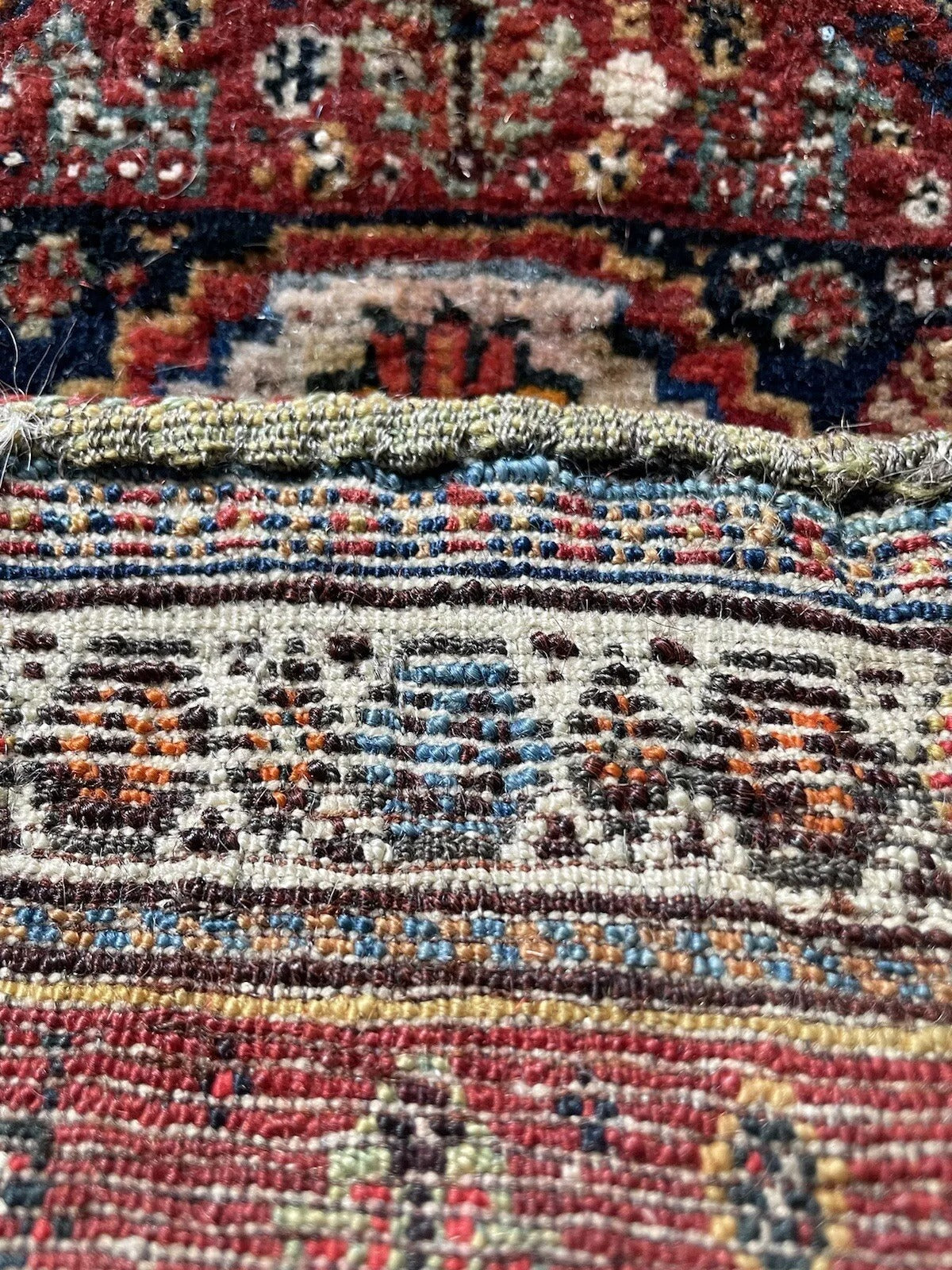 Gashkai rug with harmonious red, blue, and beige color palette

