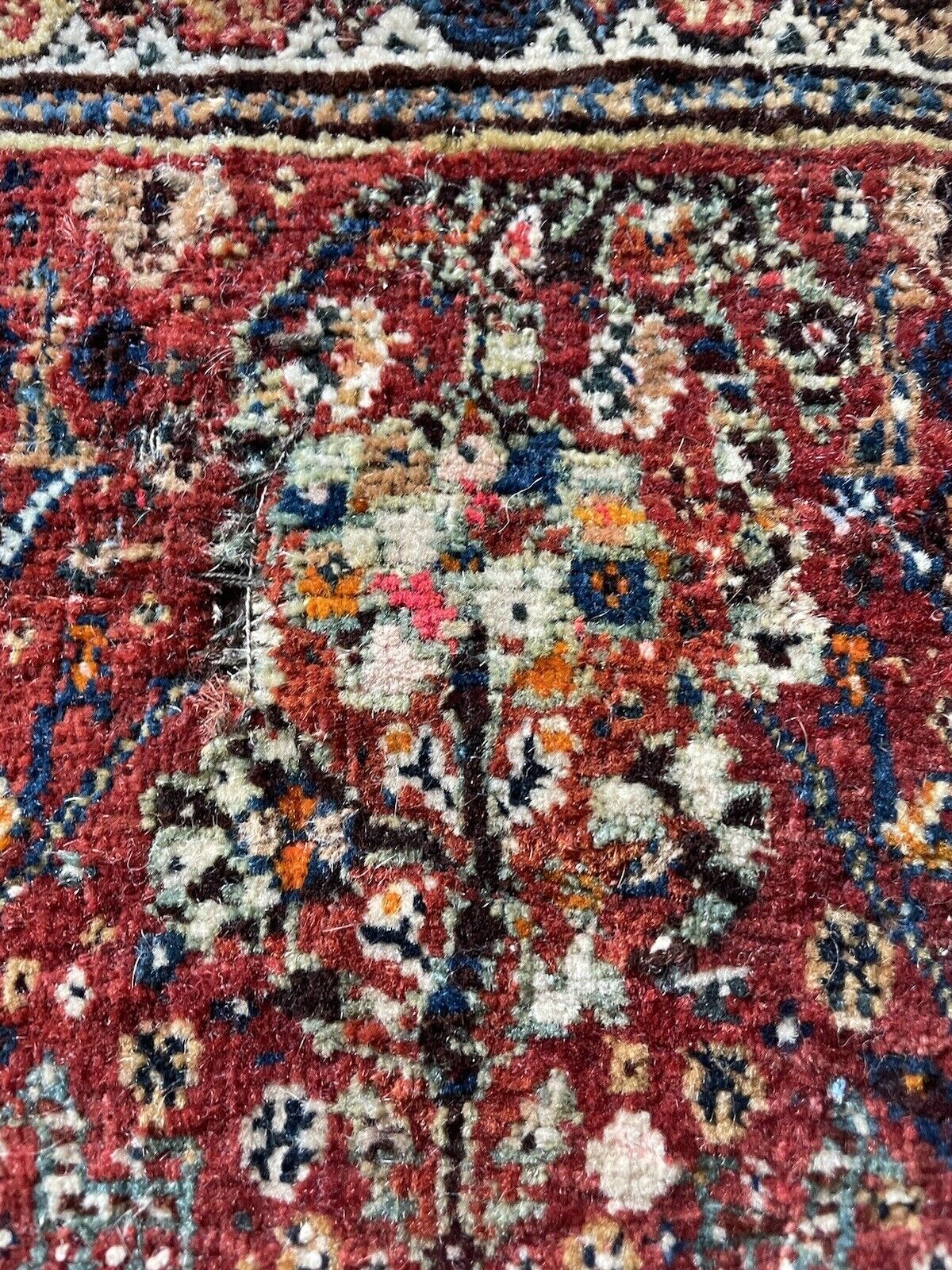 Gashkai collectible wool rug with traditional Middle Eastern design
