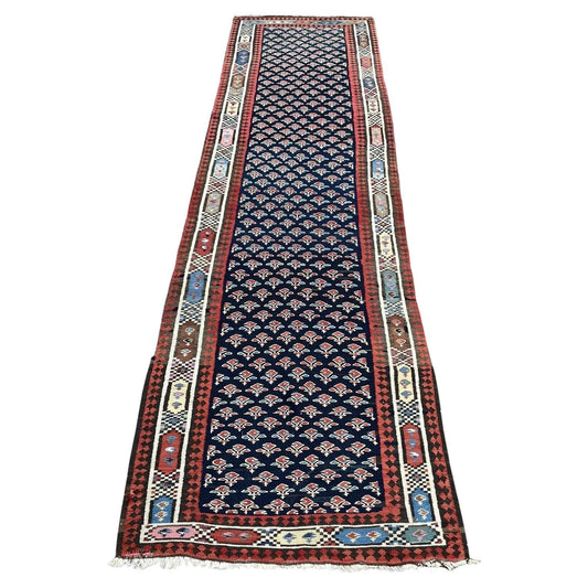 Handmade vintage Gashkai kilim runner rug with geometric patterns
