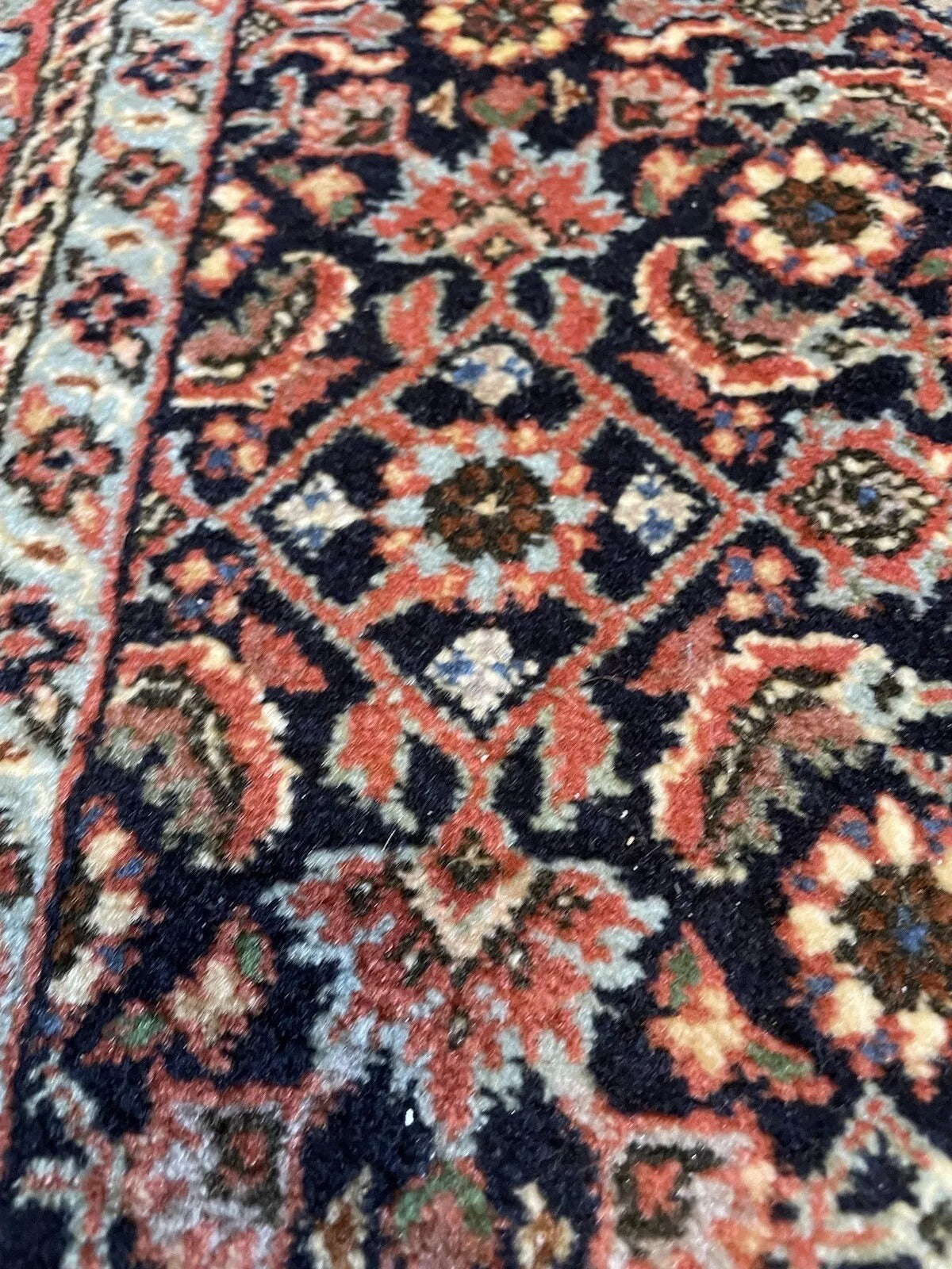Soft and durable vintage wool rug, perfect for home interiors
