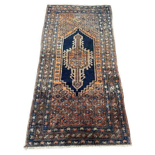 Handmade antique Persian Hamadan rug featuring intricate floral patterns
