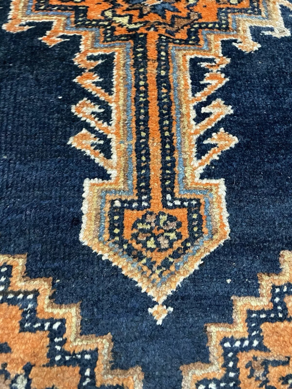 Persian Hamadan rug featuring rich colors and complex borders

