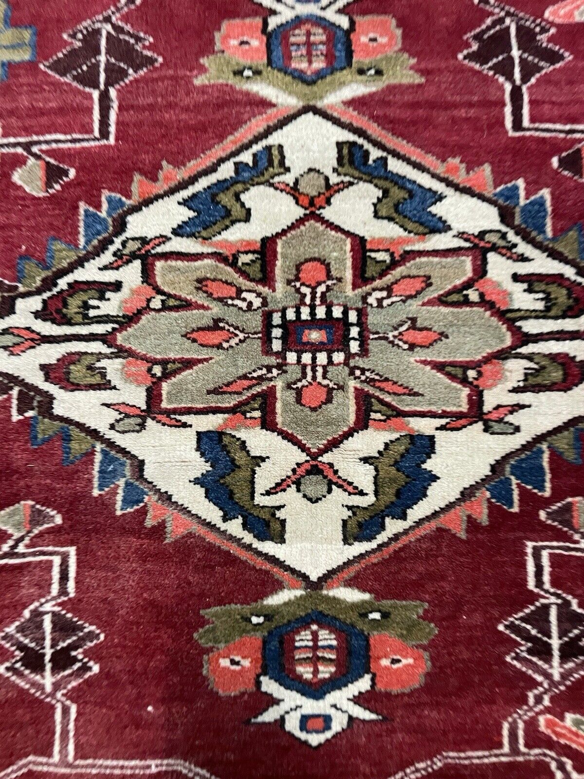 Handmade wool Persian carpet with classic Persian border.

