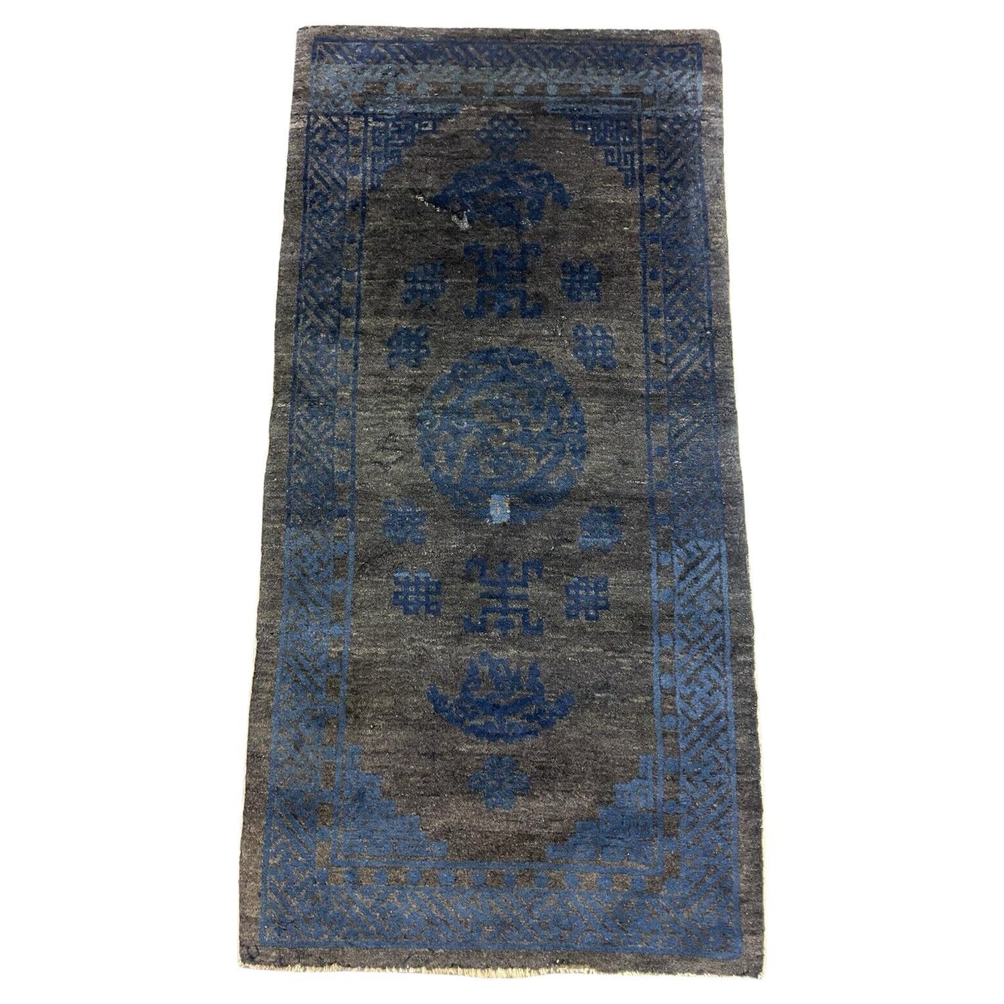 Handmade antique Peking Chinese rug with deep blue geometric patterns.

