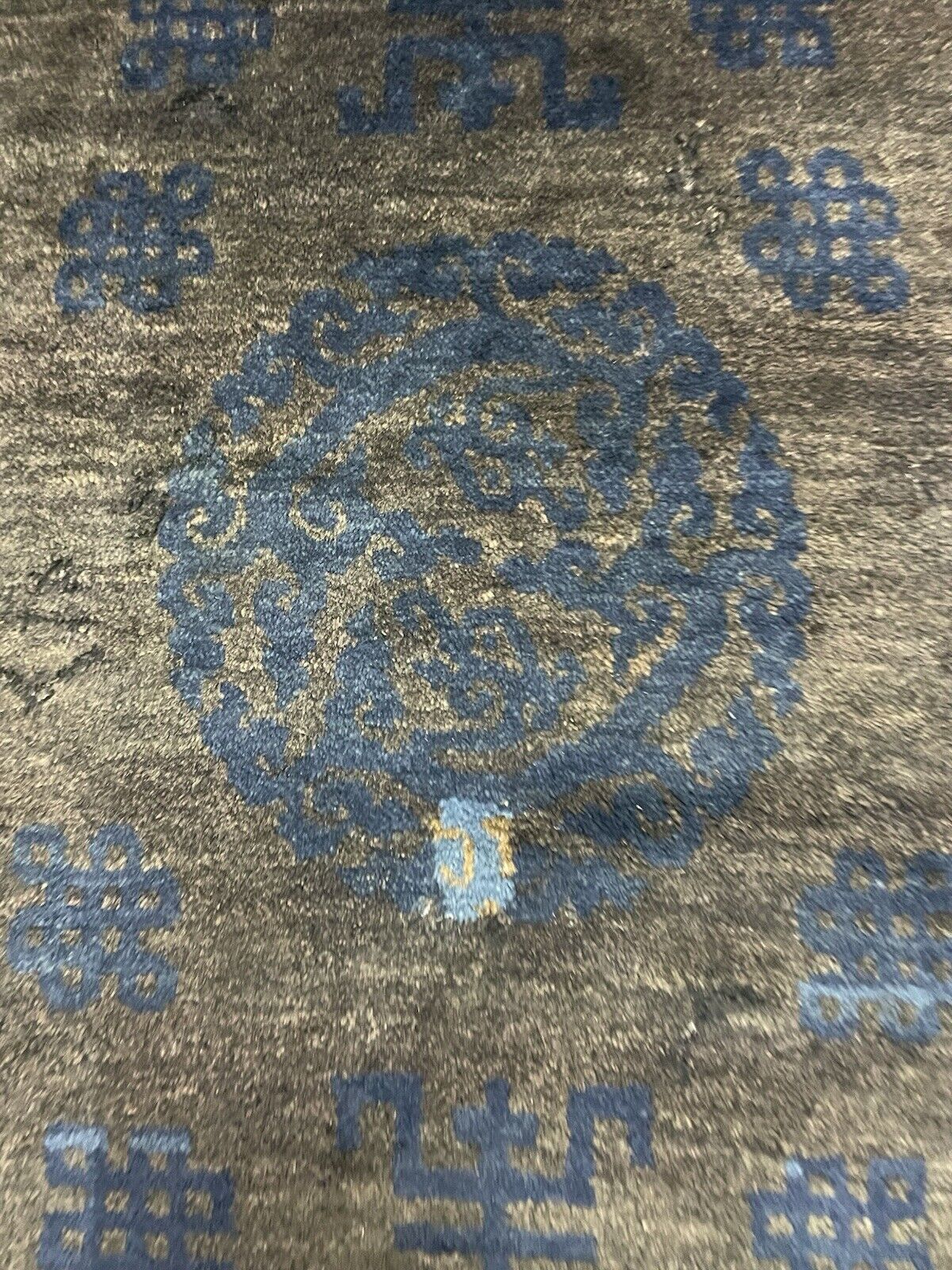 Handmade wool Peking rug showcasing traditional craftsmanship.


