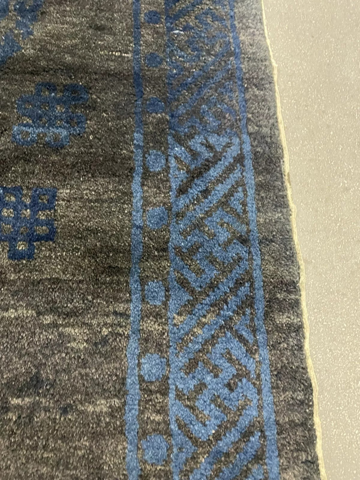 Handmade antique rug with rich cultural significance.

