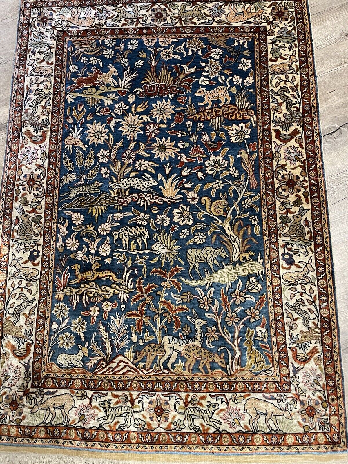 Detailed border of a handmade Turkish silk carpet.

