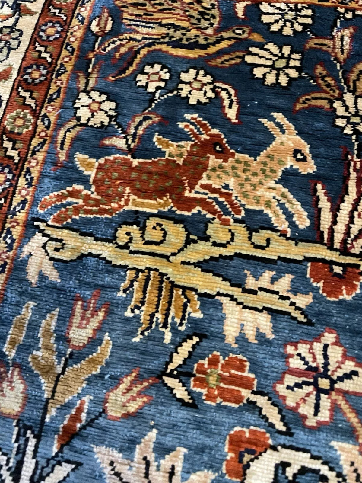 Turkish vintage silk carpet with rich colors and patterns.


