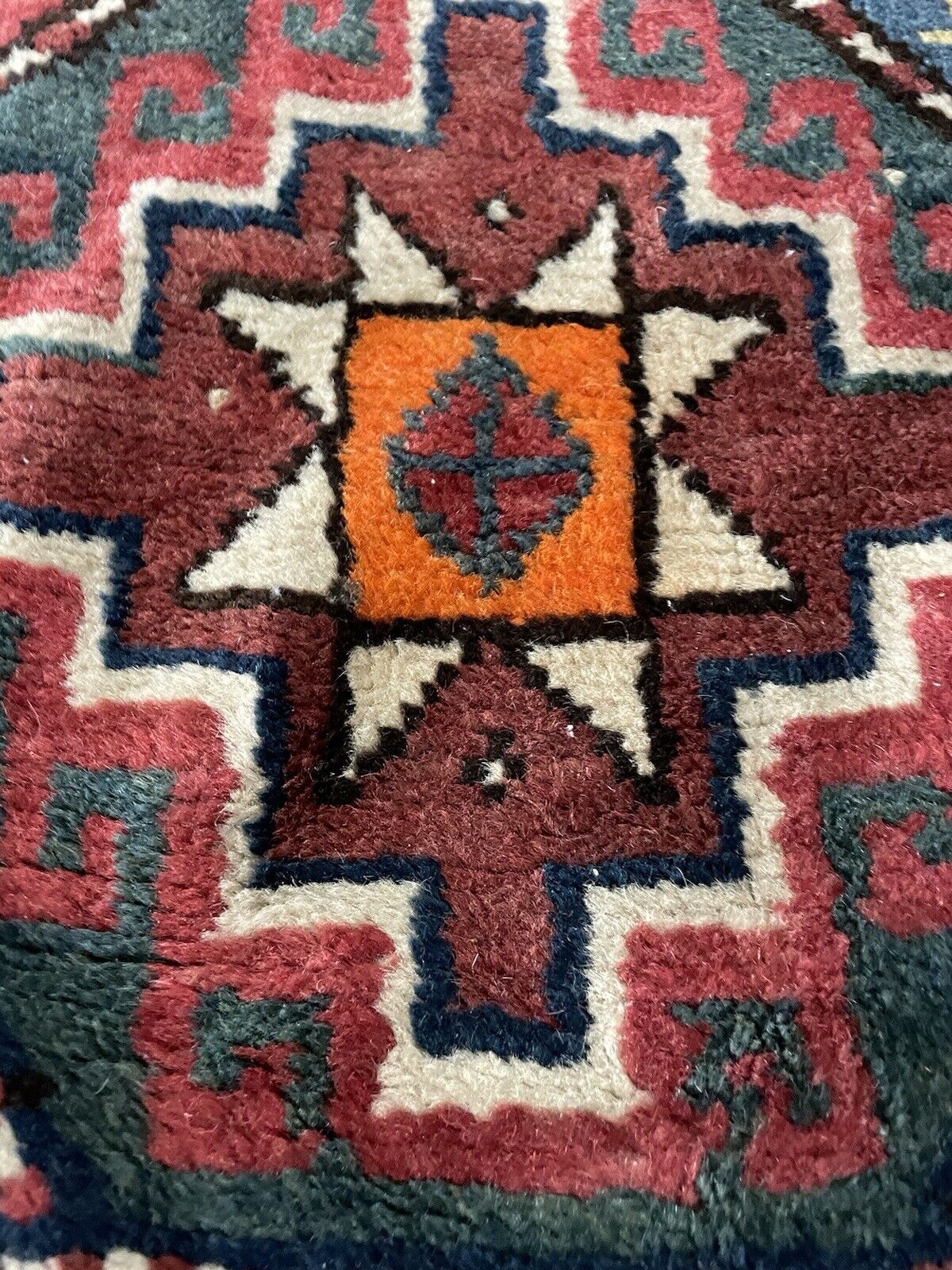 Traditional fringed edges on a 1900s Caucasian runner rug.

