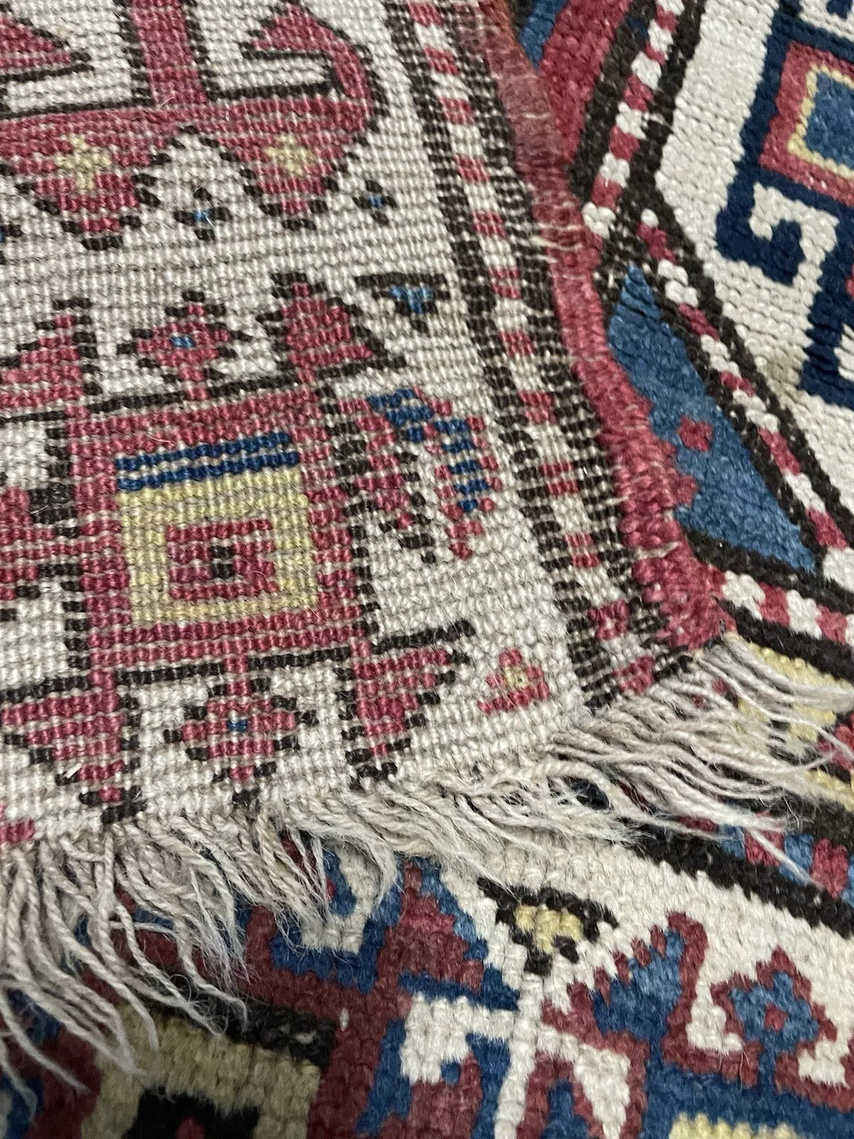 Long and narrow Genje rug with rich colors and patterns.


