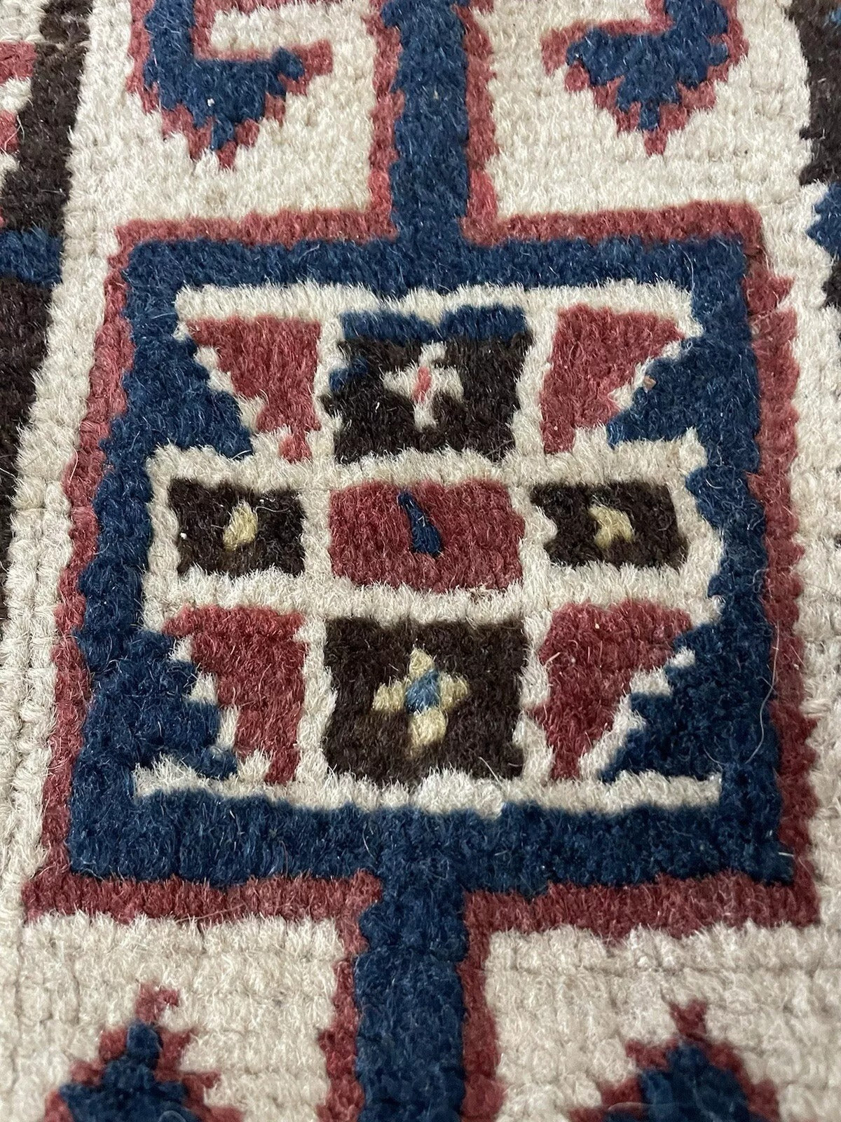Aged yet well-preserved handmade wool runner rug.


