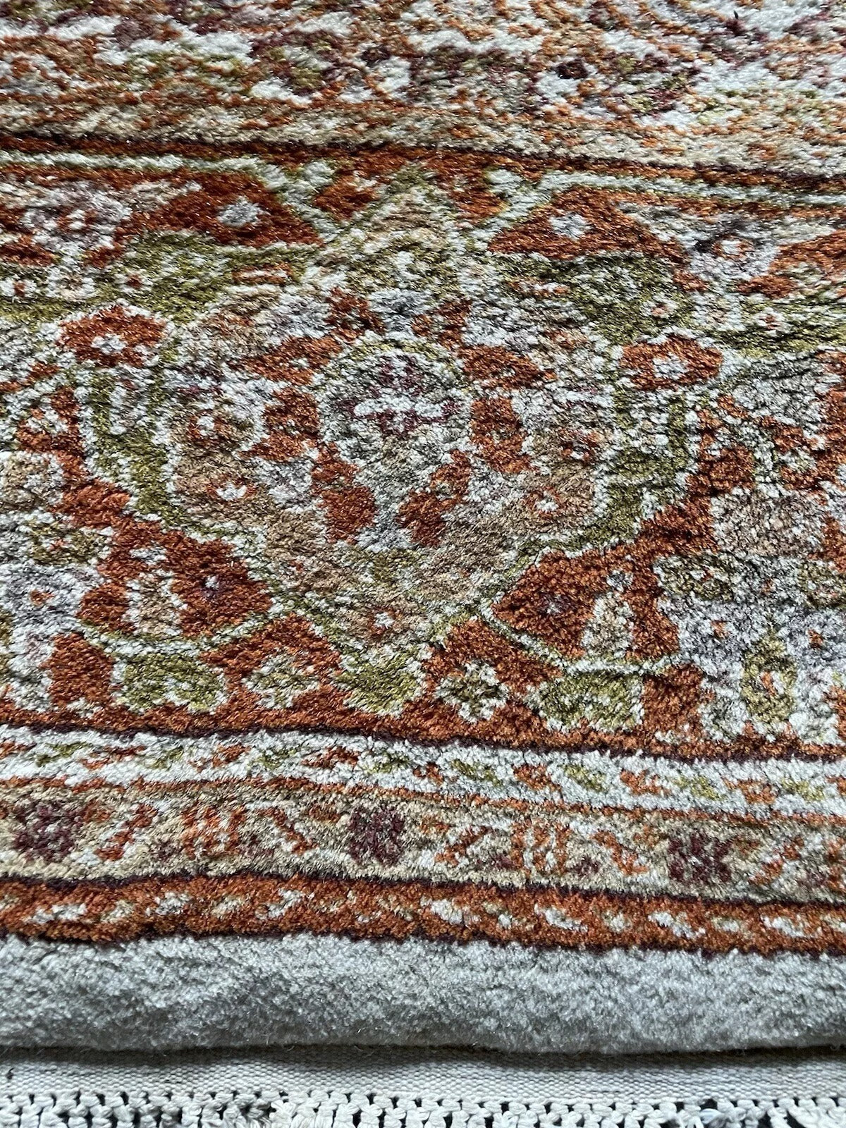 Classic Persian-style Indian rug with ornate detailing.

