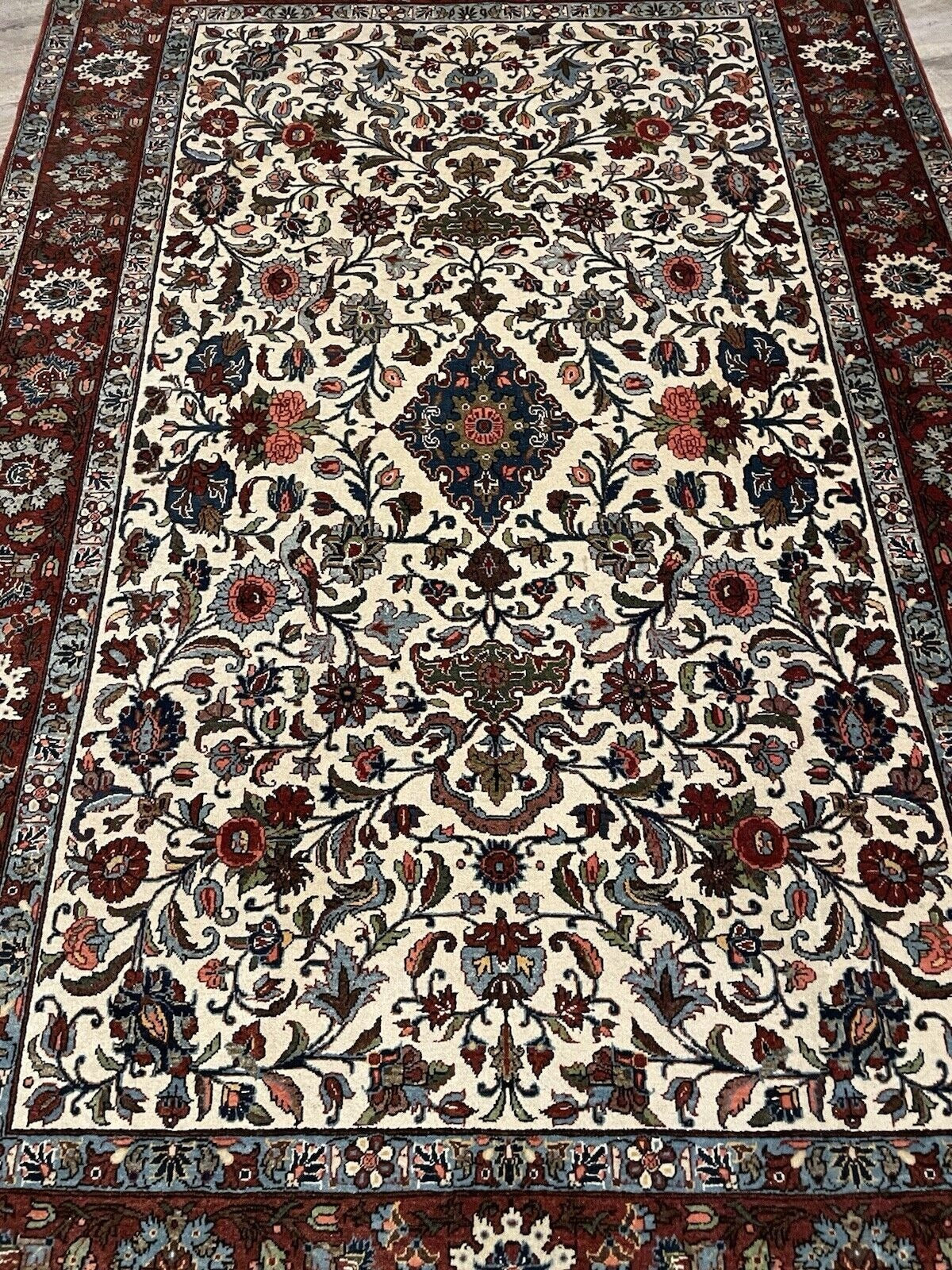 Botanical border in red and ivory tones


