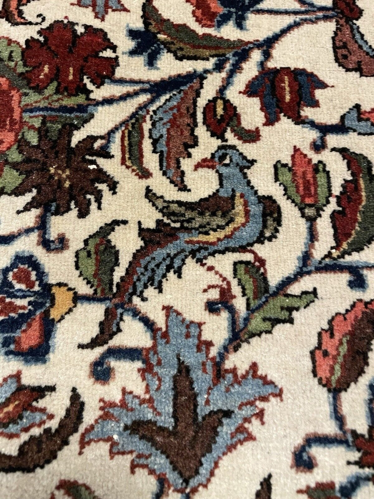 Persian village rug wool texture close-up

