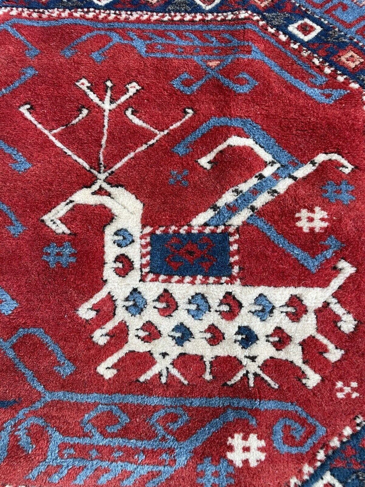 Rug weave detail with natural wool fibers visible

