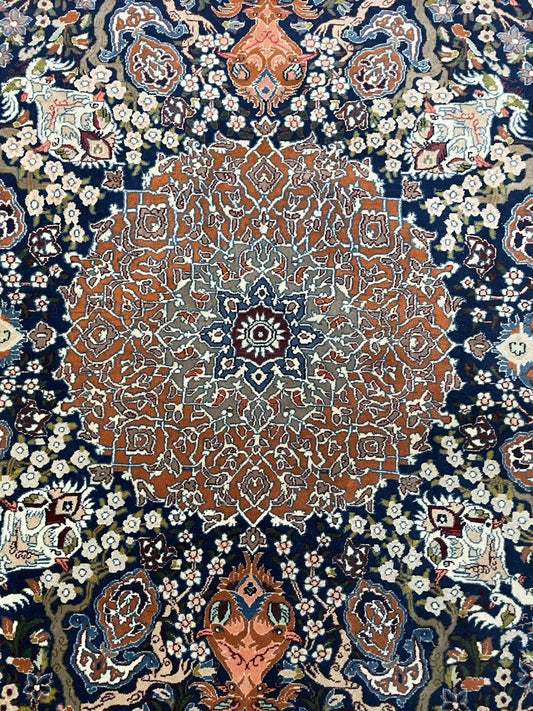Close-up of floral arabesque patterns on Isfahan rug

