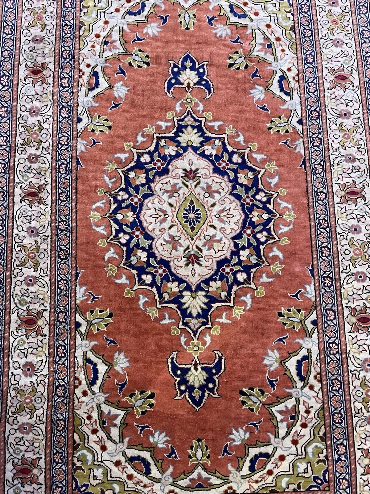 Artisan weaving detail of Keyseri rug


