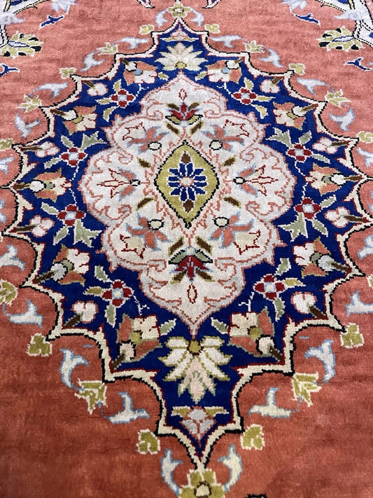 Close-up of fine silk knot detail in Keyseri rug

