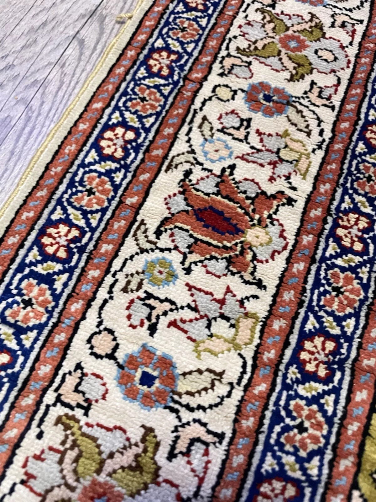 Compact Keyseri silk rug displayed flat

