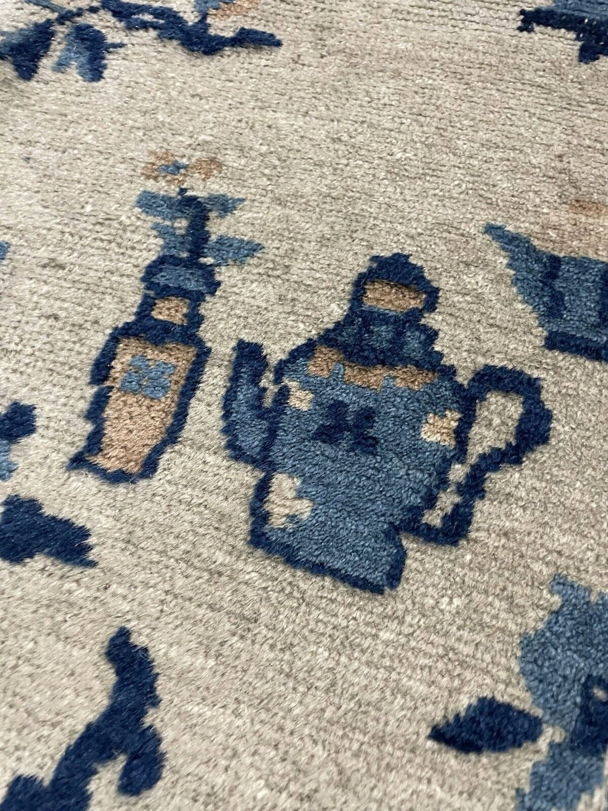 Mid-size Feti rug displayed flat in serene setting

