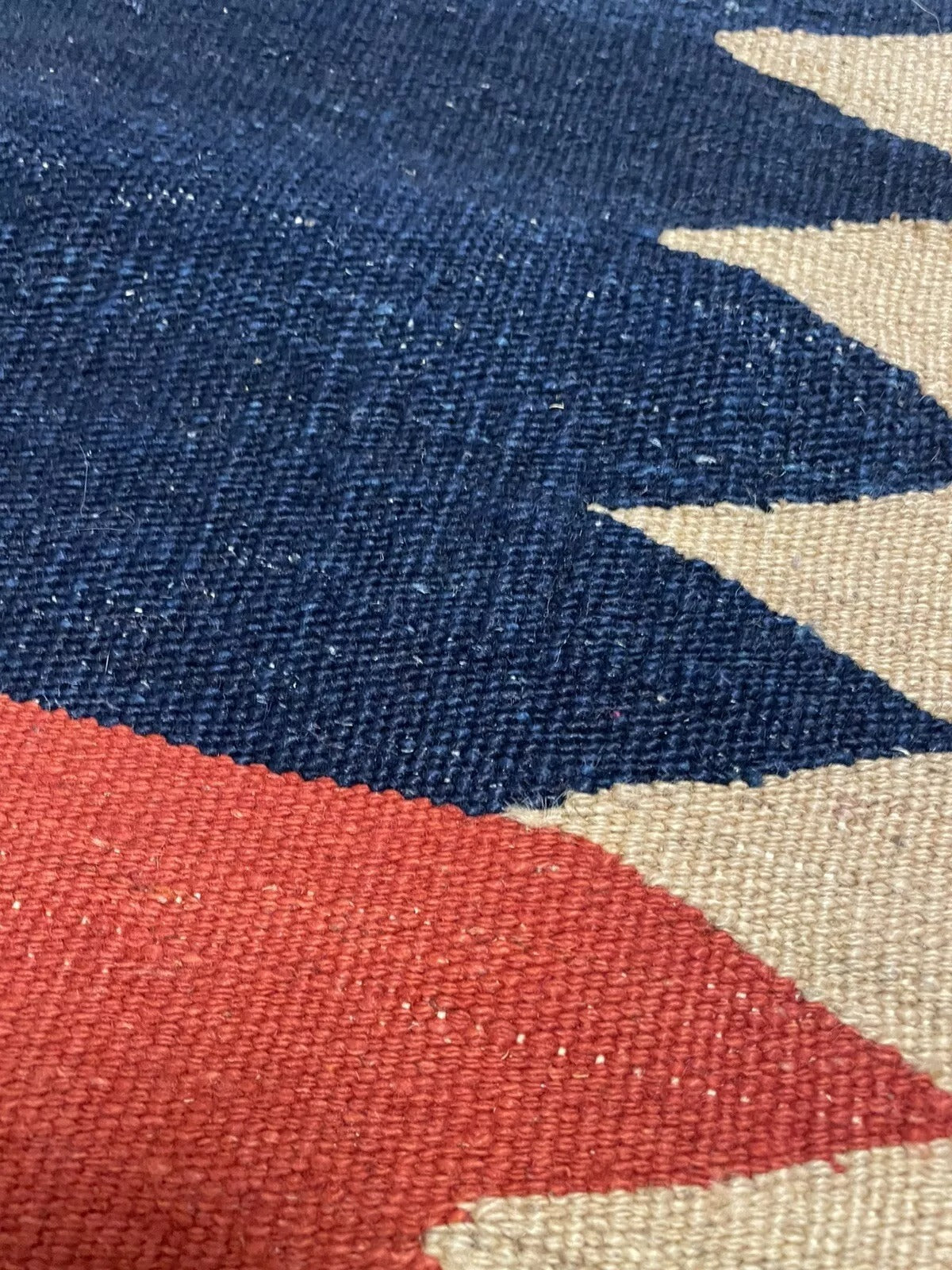Close-up of wool slits and tapestry weaving structure

