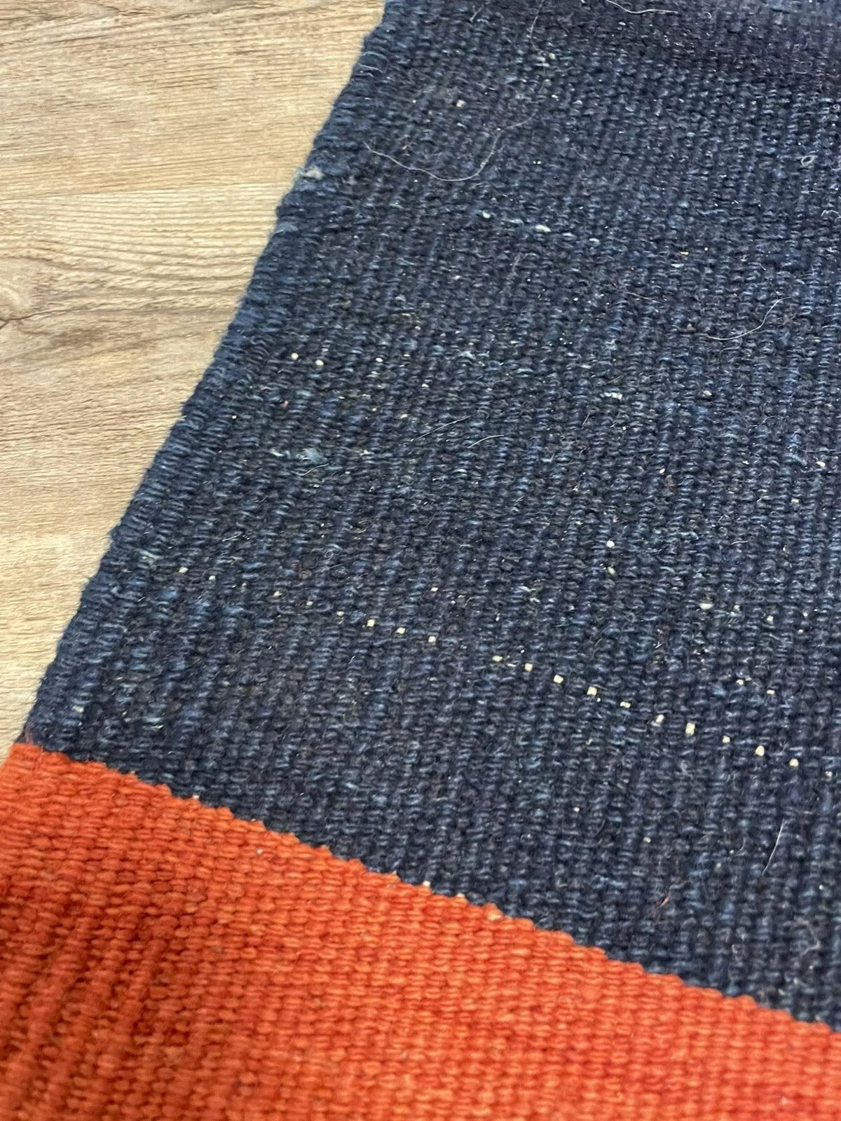 Detailed hooked lozenge motifs on wool kilim

