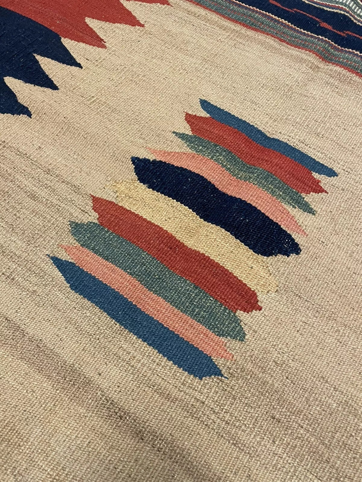 Tribal symbolic motifs woven into kilim

