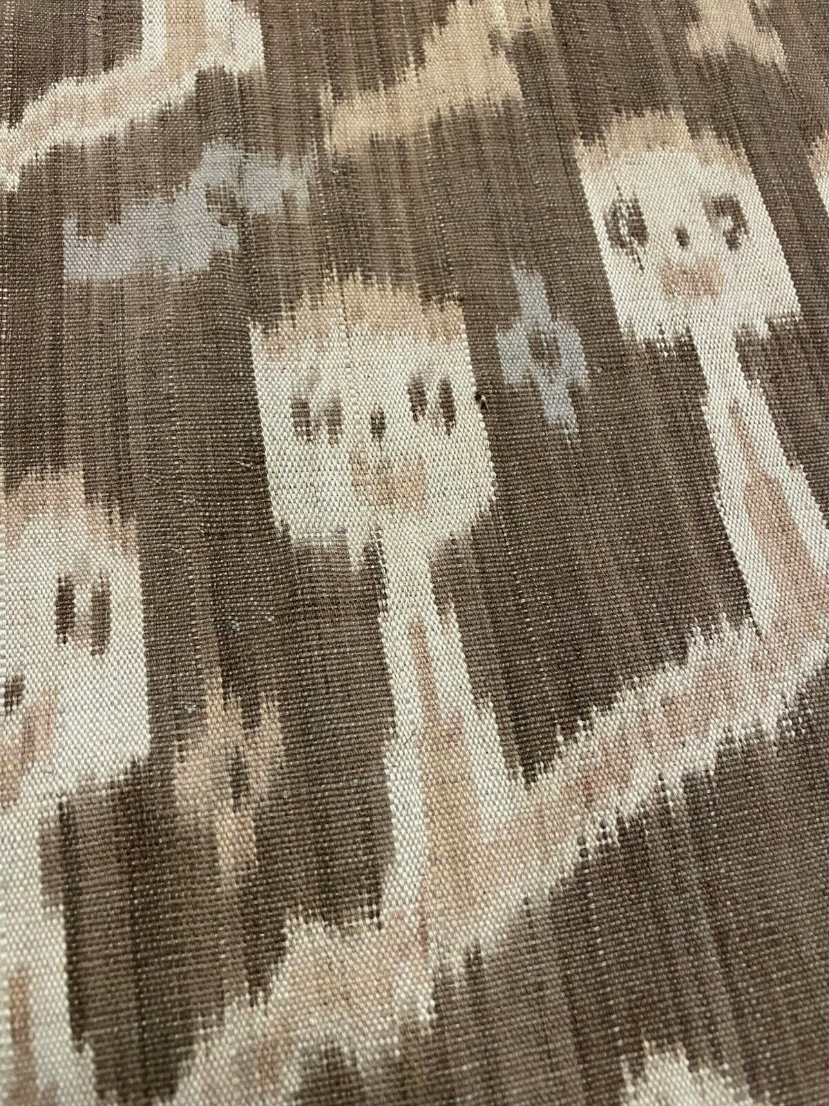 Artisan irregularity visible in hand-woven stripes