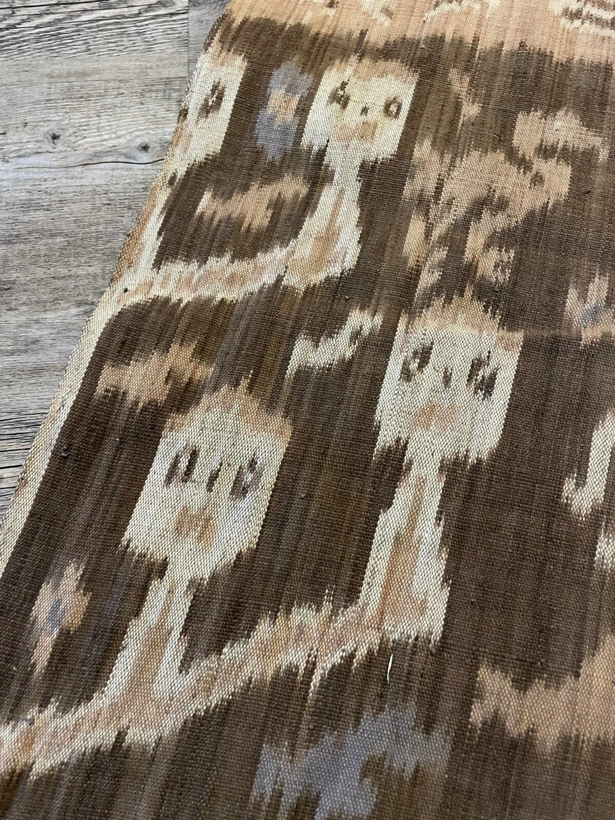 Macro of ikat dye softness and artisan detail