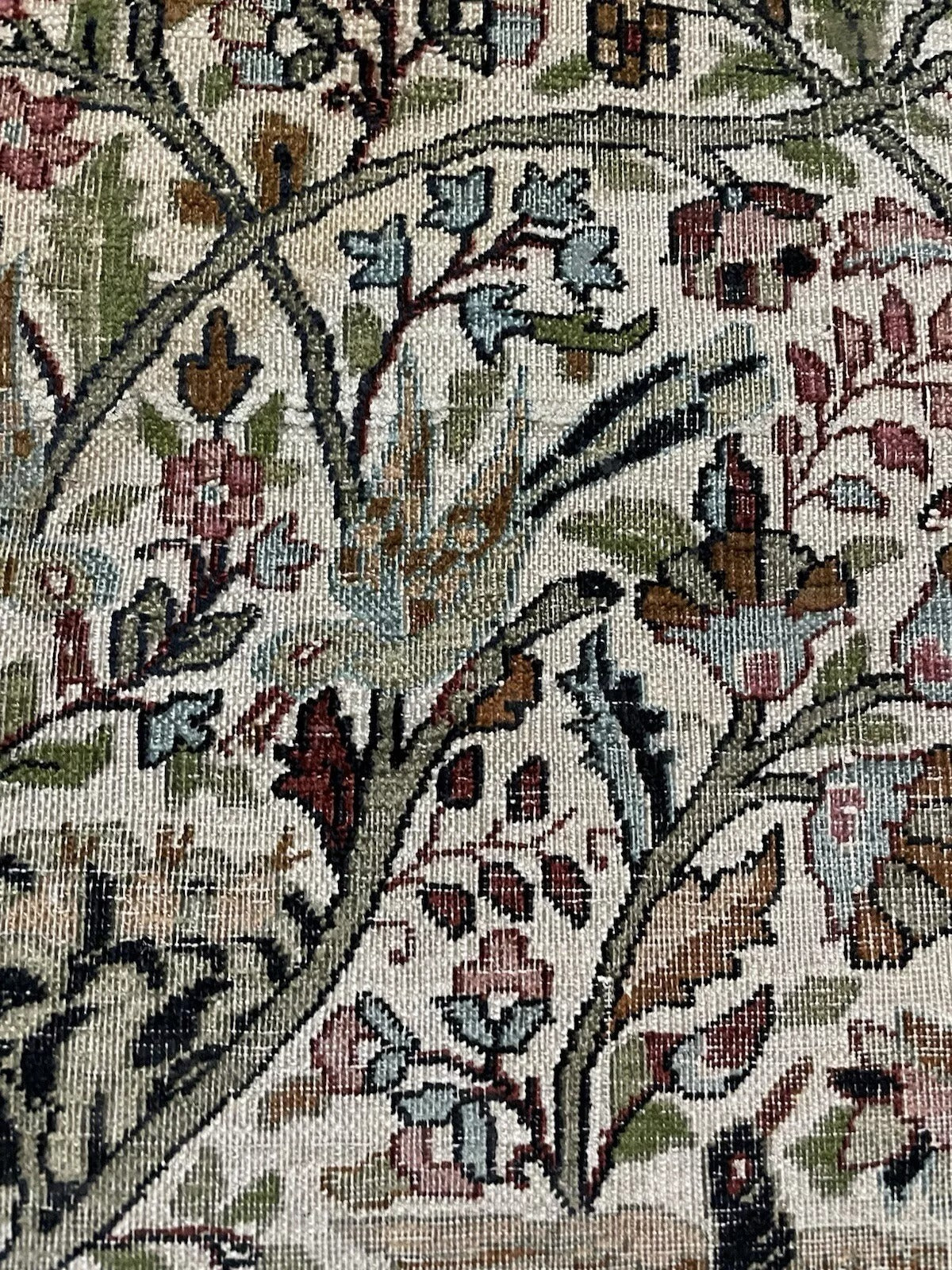 Close-up detail of the central Tree of Life motif with its intricate branches.

