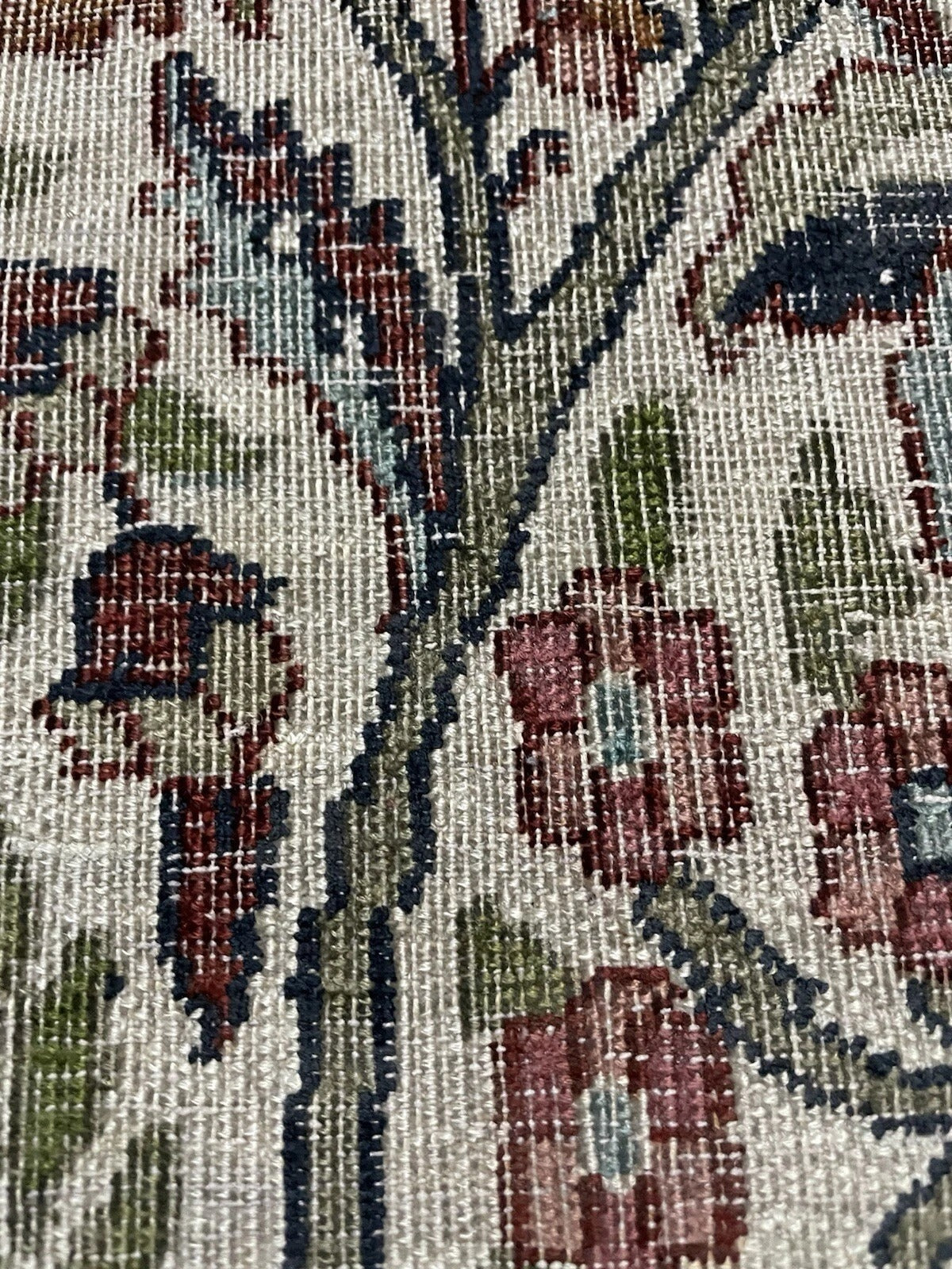 View of the rug's border pattern and its interaction with the central field.


