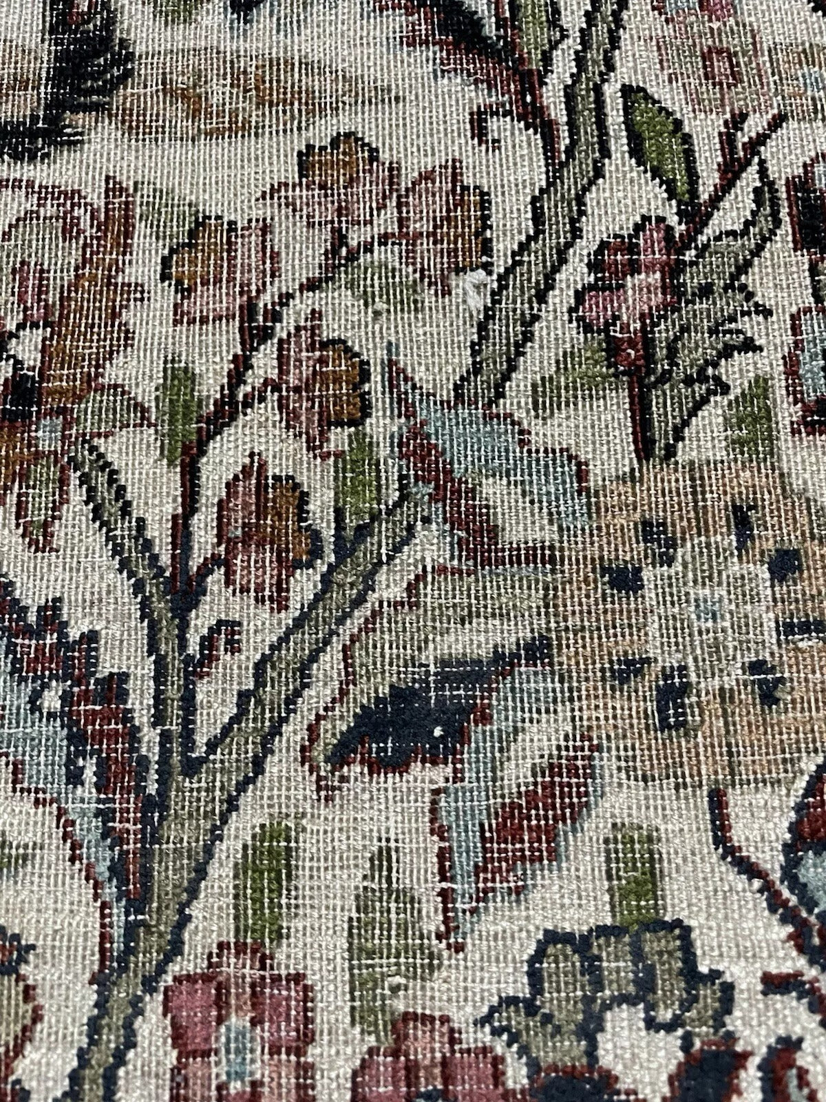 Angle shot capturing the lustrous sheen on the rug's distressed surface.

