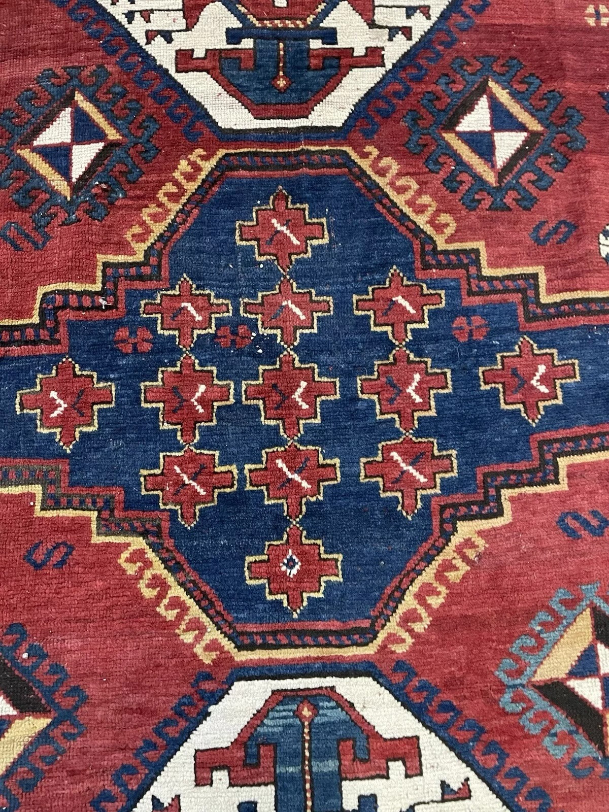 Shot focusing on one of the distinctive flanking geometric medallions.

