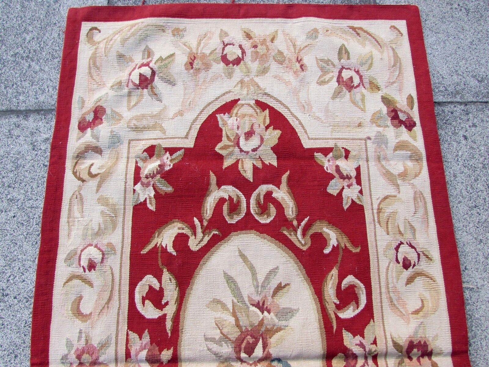 Intricate geometric and floral design on French handmade rug