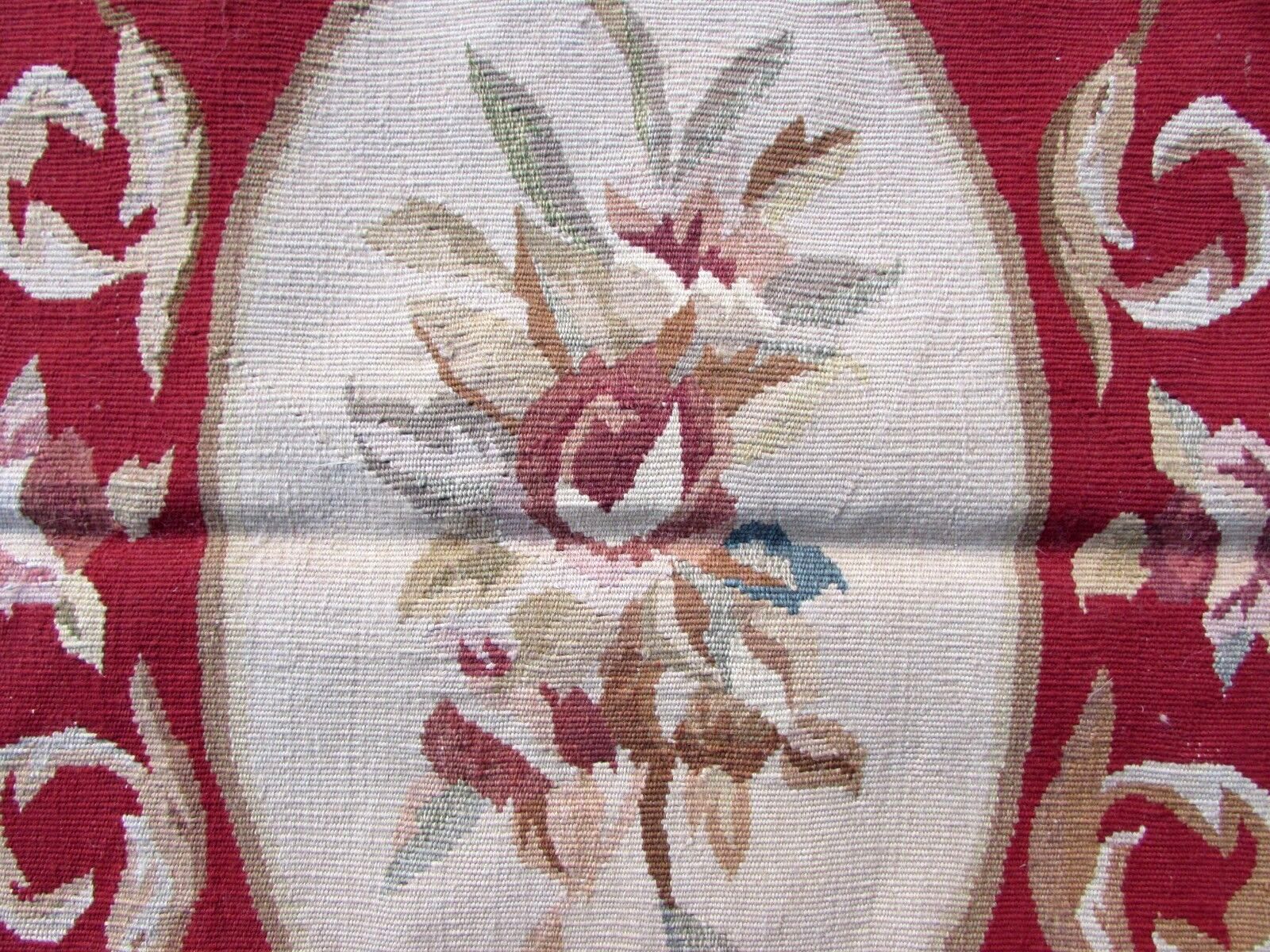 Antique handmade rug with ornate details