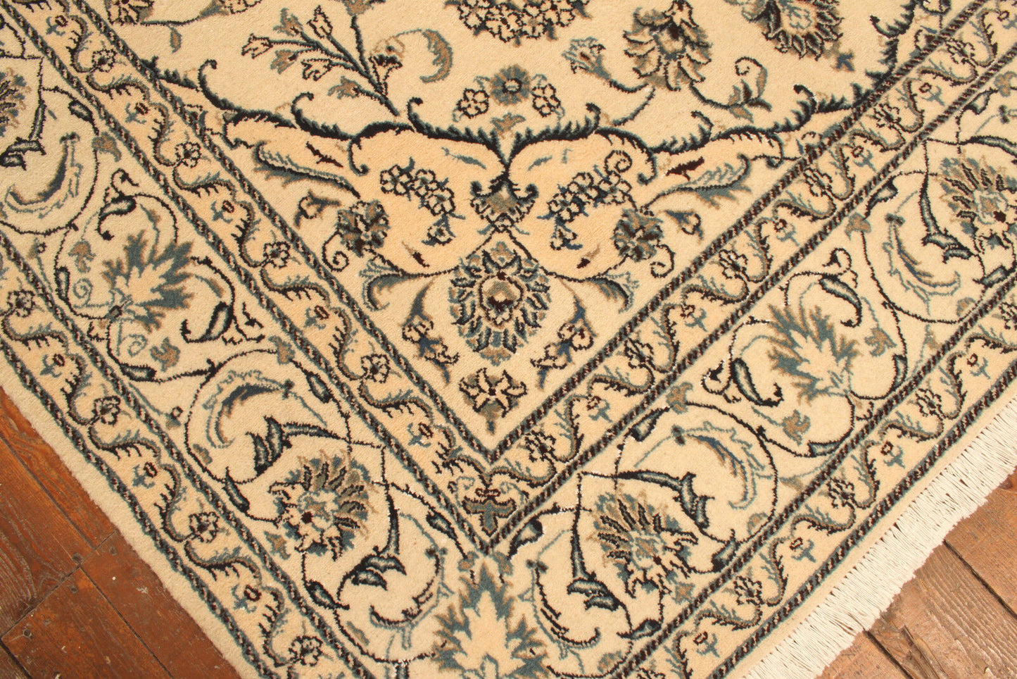 Close-up of intricate patterns on the Handmade Contemporary Persian Nain Rug