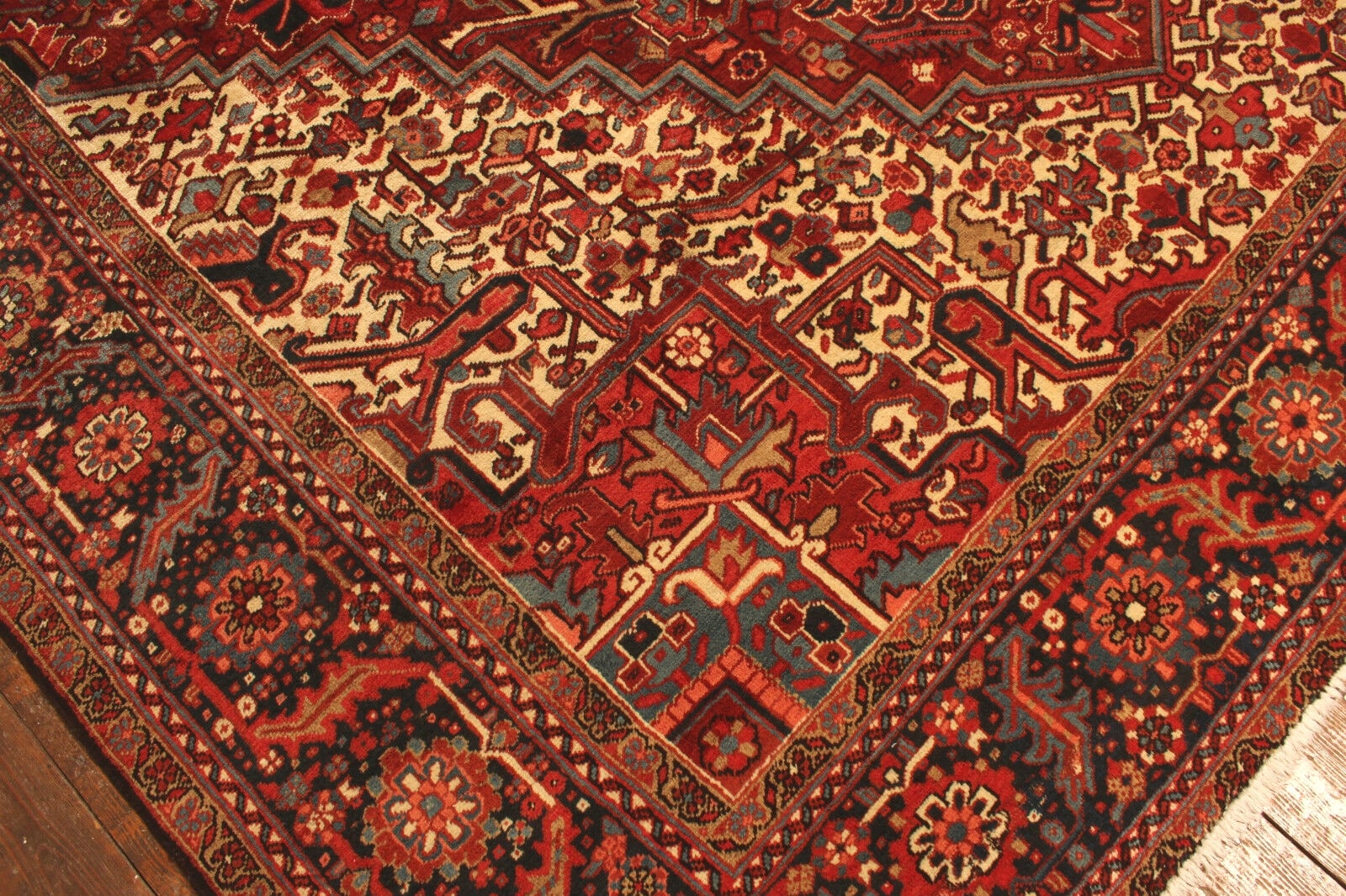 Artistic display of the Handmade Vintage Persian Style Heriz Rug as a room centerpiece