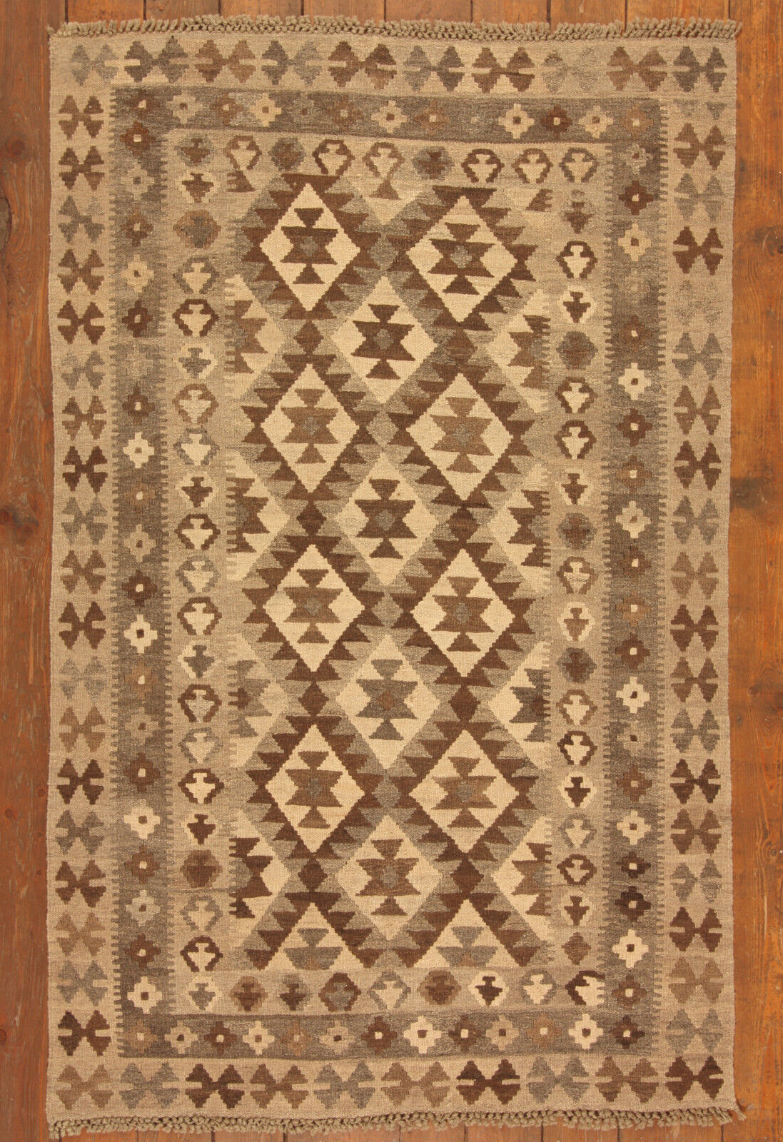 Close-up of the captivating geometric design on the Handmade Vintage Afghan Flatweave Kilim