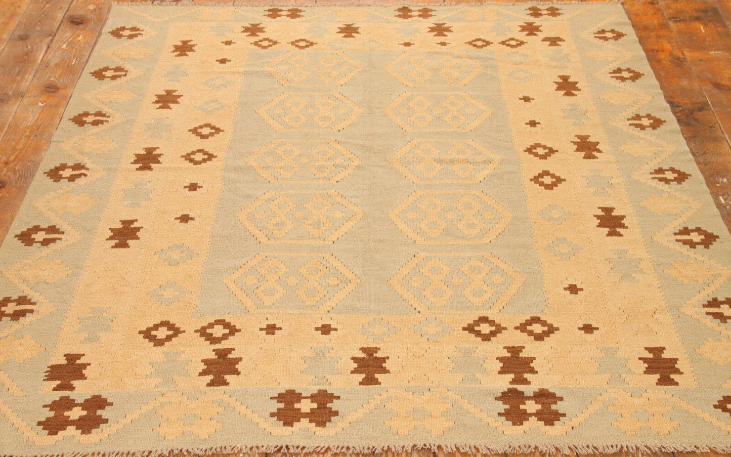 Close-up of the delicate blend of grey and beige colors on the Handmade Vintage Afghan Flatweave Kilim