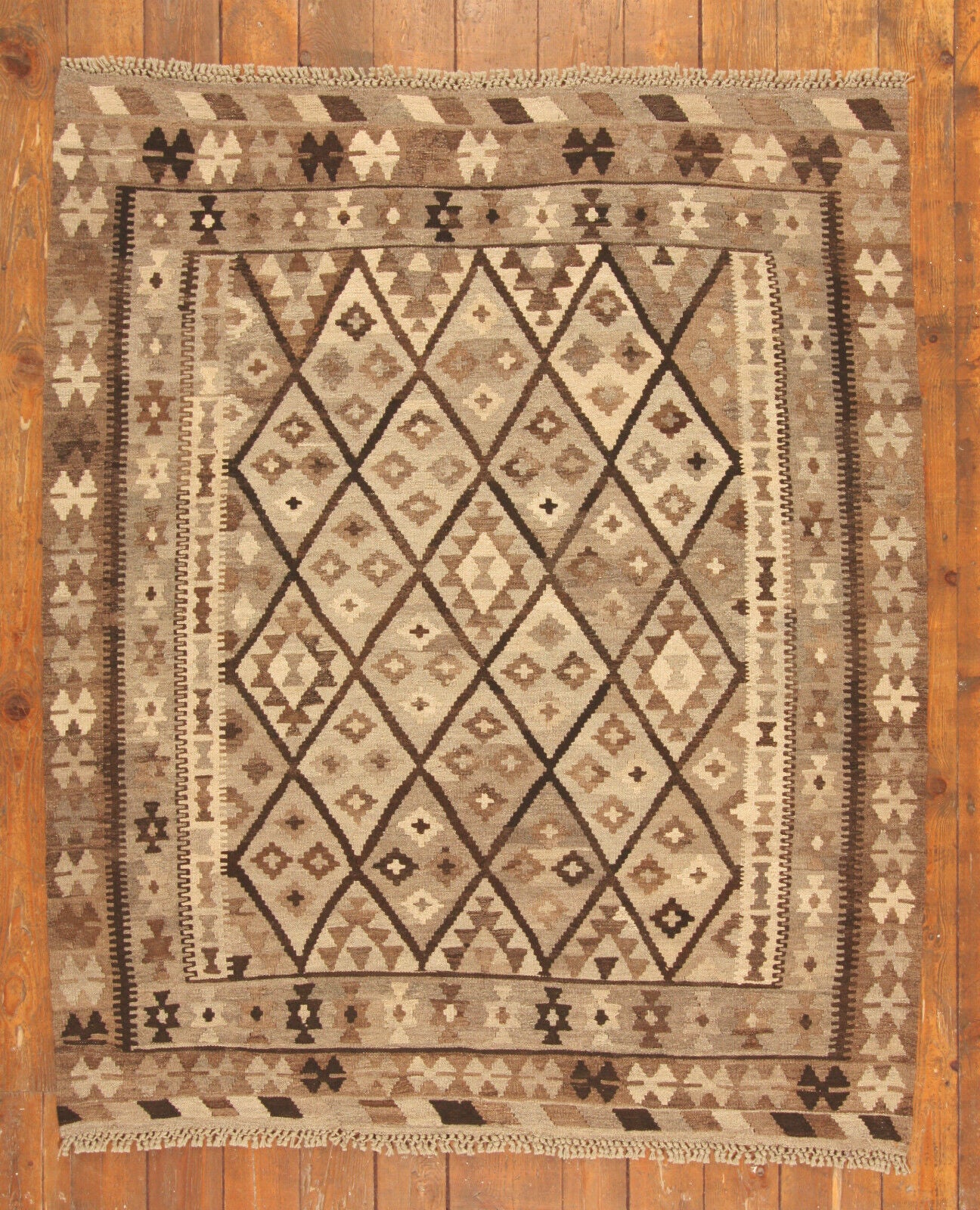 Overhead shot of the Handmade Vintage Afghan Flatweave Kilim displaying size and dimensions