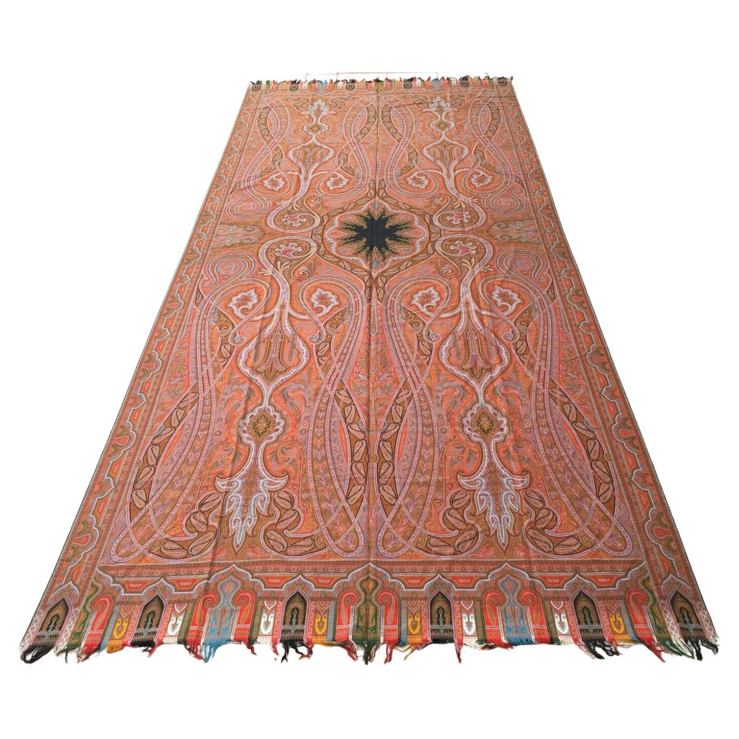 Handmade Antique Indian Cashmere Shawl featuring warm orange and red tones with intricate woven patterns